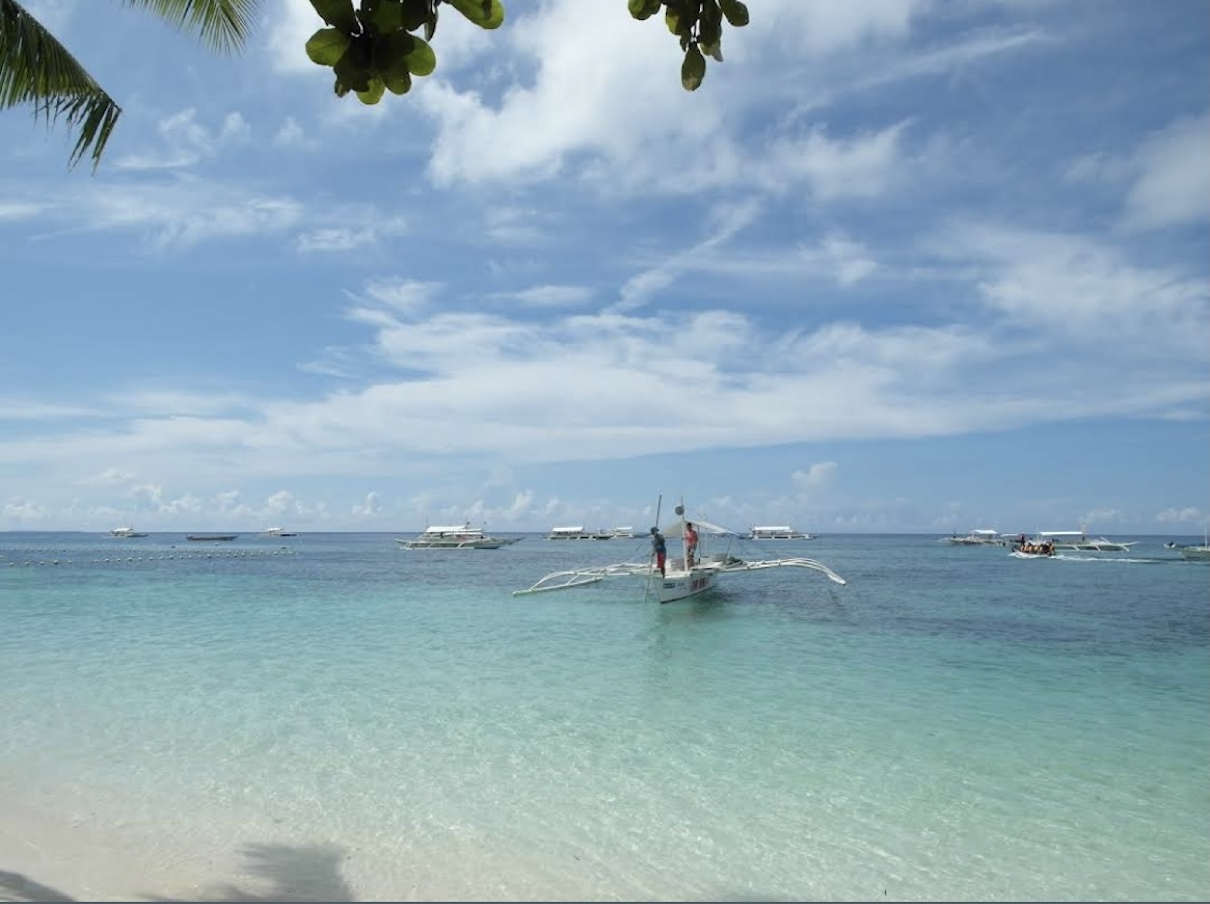 Pristine waters of Panglao and the view over Jagna
